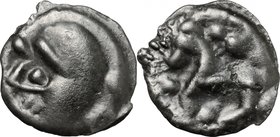 Celtic World.Northwest Gaul, Senones.Potin Unit, c. 100-50 BC.D/ Stylized helmeted head left; pellet to upper left.R/ Stylized horse left; pellets aro...
