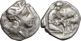 Greek Italy.Southern Apulia, Tarentum.AR Diobol, 380-325 BC.D/ Head of Athena right, wearing helmet decorated with Scylla.R/ Herakles fighting lion.HN...