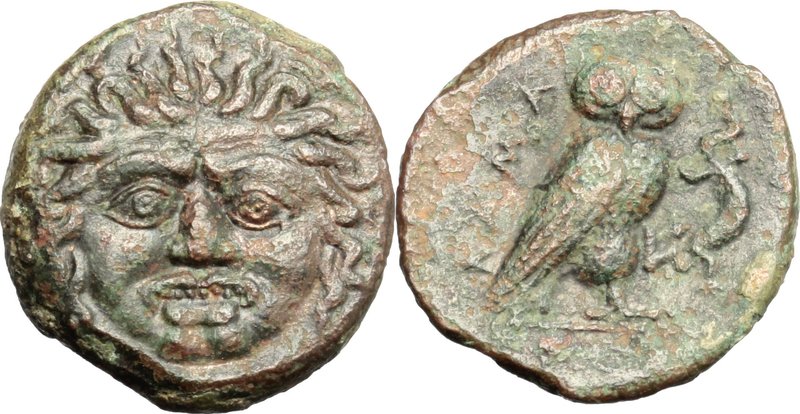 Sicily.Kamarina.AE Tetras, 420-410 BC.D/ Gorgoneion.R/ Owl standing right, holdi...
