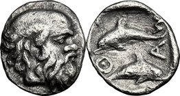 Continental Greece.Islands off Thrace, Thasos.AR Tetartemorion, c. 412-404 BC.D/ Head of satyr right.R/ Τwo dolphins in opposite directions within inc...