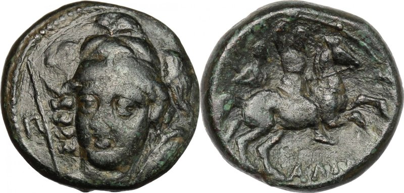 Continental Greece.Thessaly, Pharsalos.AE 19 mm. 4th-3rd centuries BC.D/ Helmete...