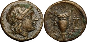 Greek Asia.Aeolis, Myrina.AE Dichalkon, c. 2nd century BC.D/ Laureate head of Apollo right.R/ Amphora; kithara right.BMC Troas p. 137, 27; SNG Cop. 22...