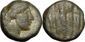 Greek Asia.Ionia (?), Unidentified mint.AE 16 mm. fourth century BC (?).D/ Head of Apollo (?) right.R/ Flattened surface with parallel undefined stria...