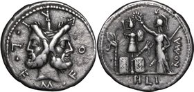 M. Furius L. f. Philus.AR Denarius, 119 BC.D/ Head of Janus, laureate.R/ Roma standing left, crowning trophy flanked by carnyx and shield on each side...