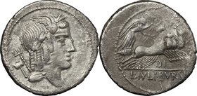 L. Iulius Bursio.AR Denarius, 85 BC.D/ Male head right with attributes of Apollo, Mercury and Neptune.R/ Victory in quadriga right.Cr. 352/1c.AR.g. 3....