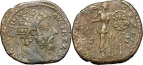 Marcus Aurelius (161-180).AE Dupondius, 170-171.D/ Head right, radiate.R/ Victory standing right, placing inscribed shield on palm tree.RIC 1002.AE.g....