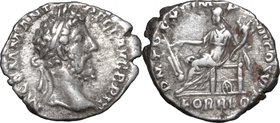 Commodus (177-193).AR Denarius, 185 AD.D/ Head right, laureate.R/ Fortuna seated left, holding rudder and cornucopiae; under the seat, wheel.RIC 131.A...