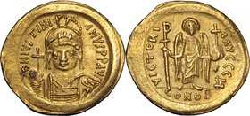 Justinian I (527-565).AV Solidus, Rome mint, 542-552.D/ Bust facing, helmeted, draped, cuirassed, holding globus cruciger.R/ Victory standing facing, ...