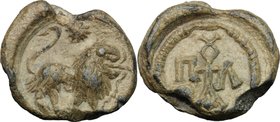 PB Seal of Paul, 6th century.D/ Lion advancing right with open jaws; above, star.R/ Monogram Π Α Λ ΟΥ.Cf. Dumbarton Oaks BZS.1958.106.3409.Lead.g. 13....