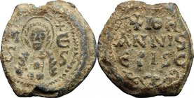 PB Seal, 8th-12th century.D/ Facing bust of Christ(?) flanked by M/S-E/S.R/ +ΙΟΗ/ΑΝΝΙS/ ΕΡΙSC/+.Lead.g. 13.08 mm. 26.50Good VF.