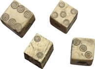Lot of 4 bone dice.
 Roman Period, 1st-3rd century AD.
 10 mm side.