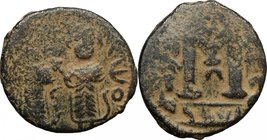 Arab-byzantine, Umayyad Caliphate, pre-reform coinage.AE Fals, Baalbek mint, 41-77 H / 661-697 AD.D/ Byzantine emperor and son, facing.R/ Large M.Walk...