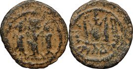 Arab-byzantine, Umayyad Caliphate, pre-reform coinage.AE Fals, Tiberias mint, 41-77 H / 661-697 AD.D/ Heraclius, flanked by Heraclius Constantine and ...