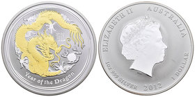 Australia. Elizabeth II. 1 dollar. 2012. Perth. P. (Km-1644.1). Ag. 31,11 g. Partial gold plated. Year of the Dragon. PR. Est...40,00.
