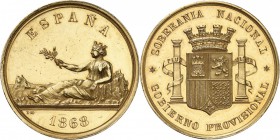 ESPAGNE. Gouvernement provisoire (1868-1871). Médaille en or 1868. Av. L’Espagne allongée à gauche et accoudée sur un rocher. Rv. Armes entre deux col...