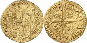 ITALIE. Naples, Charles Quint (1516-1554). Scudo. Av. Ecu, aigle bicéphale au-dessus. Rv. Croix ornée de quatre flammes. P.r 11, Fr. 835. 3,36 grs. TT...