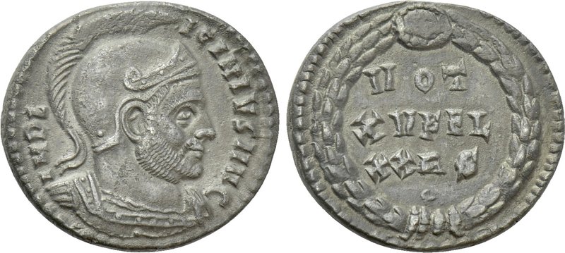 LICINIUS I (308-324). Follis. Rome. 

Obv: IMP LICINIVS AVG. 
Helmeted and cu...