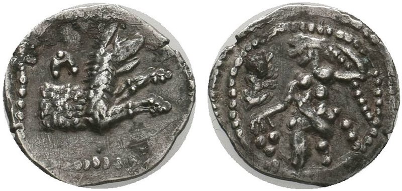 LYCAONIA. Laranda. Circa 324/3 BC. Obol. Baaltars seated left, holding grain ear...