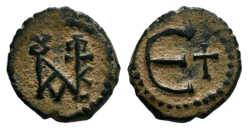 Justin II Æ 5 Nummi. Antioch, AD 569-578. Monogram / Large E, cross to right. MI...