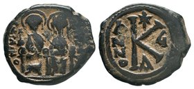 Justin II and Sophia (565-578). Æ 20 Nummi . Constantinople. Justin and Sophia seated facing on double throne, holding globus cruciger and cruciform s...