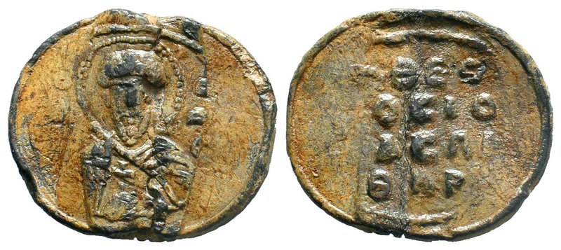 Lead seal of Theodosius imperial protospatharios (ca 11th cent.) Diam.: mm Weigh...
