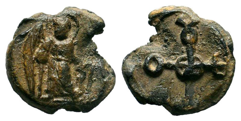 Lead seal of Theodoros (?) (7th cent.) Diam.: mm Weight: gr. Condition: F/VF. 

...