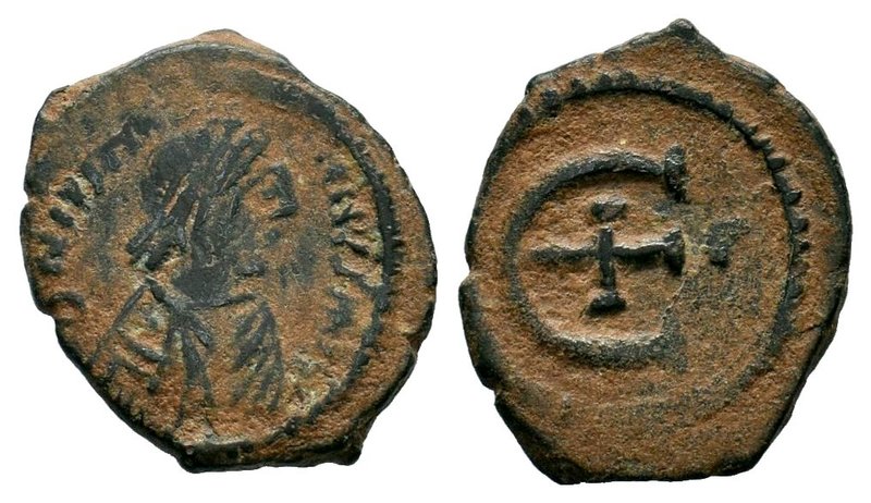 Justinian I. AE. 527-565 AD.

Condition: Very Fine

Weight: 2.02 gr
Diameter: 18...