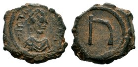 Tiberius II Constantine. 578-582. AE 

Condition: Very Fine

Weight: 4.39 gr
Diameter: 18 mm