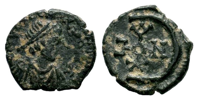 Justinian I (527-565). Æ

Condition: Very Fine

Weight: 1.64 gr
Diameter: 14 mm