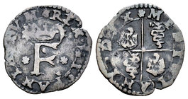 Philip II (1556-1598). Trillina. Milano. (Vti-4). (Mir-335/1 variante). Ae. 0,74 g. Roseta de 6 pétalos acotando la sigla. Almost VF. Est...60,00.