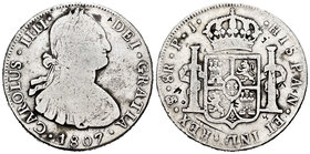 Charles IV (1788-1808). 8 reales. 1807. Potosí. PJ. (Cal-731). Ag. 26,37 g. Pequeños resellos orientales. F. Est...50,00.