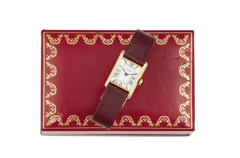Cartier, “Tank”, cassa No 48868. Orologio da polso, da donna, in oro giallo 18K,...