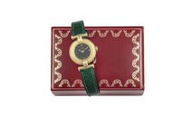 Cartier “Rivoli”, Ref. 058711. Orologio da polso, da donna, al quarzo, placcato oro con fibbia originale. Accompagnato dalla scatola originale e Garan...