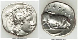 LUCANIA. Thurium. Ca. 410-350 BC. AR stater (22mm, 7.69 gm, 2h). XF. Head of Athena right, wearing crested Attic helmet decorated with Scylla brandish...