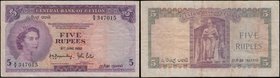 Ceylon Central Bank 5 Rupees Pick 51 dated 3rd June 1952 serial number G/2 347015. A dazzling and exquisite Bradbury, Wilkinson & Co. printing in purp...