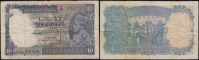 India Government 10 Rupees Pick 16b ND 1935 issue red serial number P/85 992735 and signature J.W. Kelly. The note in dark blue on olive and light ora...