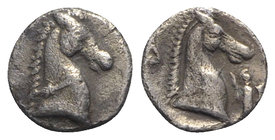 Southern Apulia, Tarentum, c. 325-280 BC. AR 3/4 Obol (8mm, 0.51g, 1h). Horse's head r. R/ Horse's head r.; Δ to l., Athena Promachos to r. Vlasto 170...