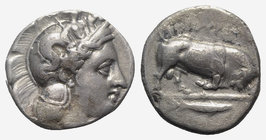Southern Lucania, Thourioi, c. 400-350 BC. AR Stater (20mm, 7.68g, 5h). Helmeted head of Athena r., helmet decorated with Skylla pointing and holding ...