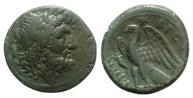 Bruttium, The Brettii, c. 214-211 BC. Æ Unit (21.5mm, 8.09g, 3h). Laureate head of Zeus r.; grain ear behind. R/ Eagle standing l., with wings spread;...