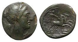 Bruttium, The Brettii, c. 211-208 BC. Æ Half Unit (15mm, 2.64g, 5h). Diademed and winged bust of Nike r. R/ Zeus driving biga r.; plow below. HNItaly ...