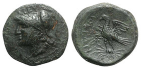 Bruttium, Lokroi Epizephyrioi. Time of Pyrrhos of Epeiros, c. 281-272 BC. Æ (19mm, 5.32g, 6h). Helmeted head of Athena l.; EY above. R/ Eagle standing...