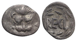 Bruttium, Rhegion, c. 445-435 BC. AR Litra (11mm, 0.63g, 3h). Facing lion’s scalp. R/ RECI within wreath. Herzfelder p. 89, B; HNItaly 2485. Near VF