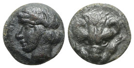 Bruttium, Rhegion, c. 415/0-387 BC. Æ (10mm, 1.35g, 1h). Facing lion's scalp. R/ Laureate head of Apollo l. HNItaly 2527; SNG ANS -. Green patina, VF