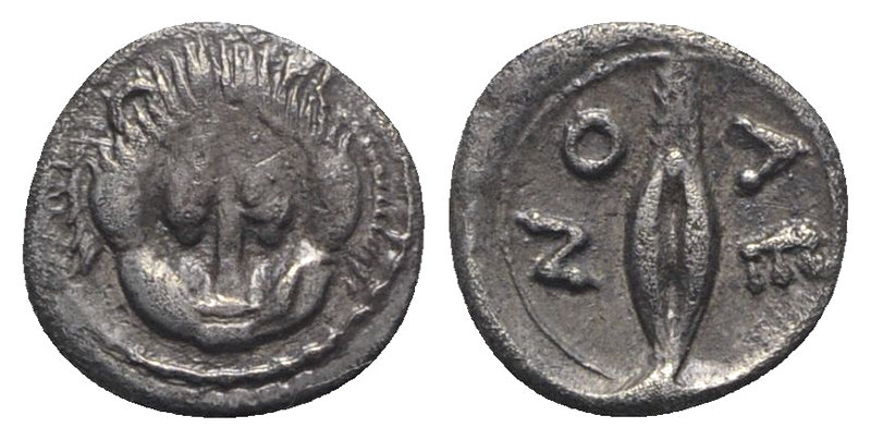 Sicily, Leontinoi, c. 476-466 BC. AR Litra (8mm, 0.65g, 9h). Facing lion’s scalp...