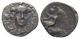 Sicily, Morgantina, c. 339/8-317 BC. AR 1¼ Litra (10mm, 0.90g, 12h). Head of Athena facing slightly r., wearing crested helmet. R/ Nike seated l. on r...