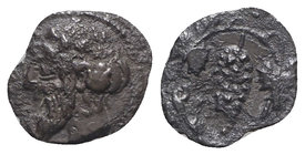 Sicily, Naxos, c. 461-430 BC. AR Litra (10mm, 0.29g, 9h). Bearded head of Dionysos l., wearing ivy-wreath. R/ Bunch of grapes on vine. Cahn 92–6; Camp...