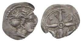 Sicily, Syracuse. Dionysios I (405-367 BC). AR Hemilitron (8mm, 0.12g, 3h), c. 405-395 BC. Head of Arethusa r., hair bound in ampyx and sphendone. R/ ...