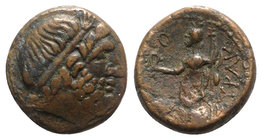 Sicily, Syracuse. Roman rule, after 212 BC. Æ (19mm, 5.83g, 12h). Male head r., wearing tainia. R/ Isis standing slightly l., holding wreath and staff...