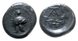 Sicily, Tauromenion, Campanian mercenaries, c. 392-358 BC. Æ (11.5mm, 2.02g, 9h). Campanian helmet r. R/ Monogram within laurel wreath. Campana (Kampa...