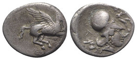 Epeiros, Ambrakia, c. 404-360 BC. AR Stater (21mm, 8.06g, 12h). Pegasos flying l. R/ Helmeted head of Athena r.; A to l.; to r., warrior, nude but for...